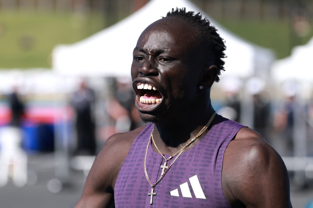 Australia’s Gout Gout reacts after winning the men’s 200M final at the Australian Athletics Championships in Sydney on April 12, 2026. — AFP pic 