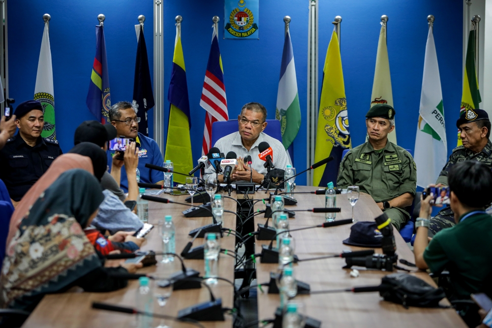 Police may use extradition to bring back overseas suspects in ‘corporate mafia’ probe, says home minister