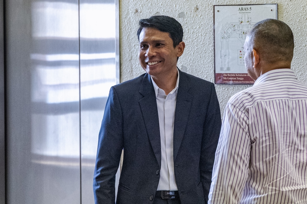 Former Registrar of Societies (RoS) assistant director Mohamad Amin Idris is pictured at the Kuala Lumpur Court Complex, in Kuala Lumpur April 13, 2026. — Picture by Firdaus Latif