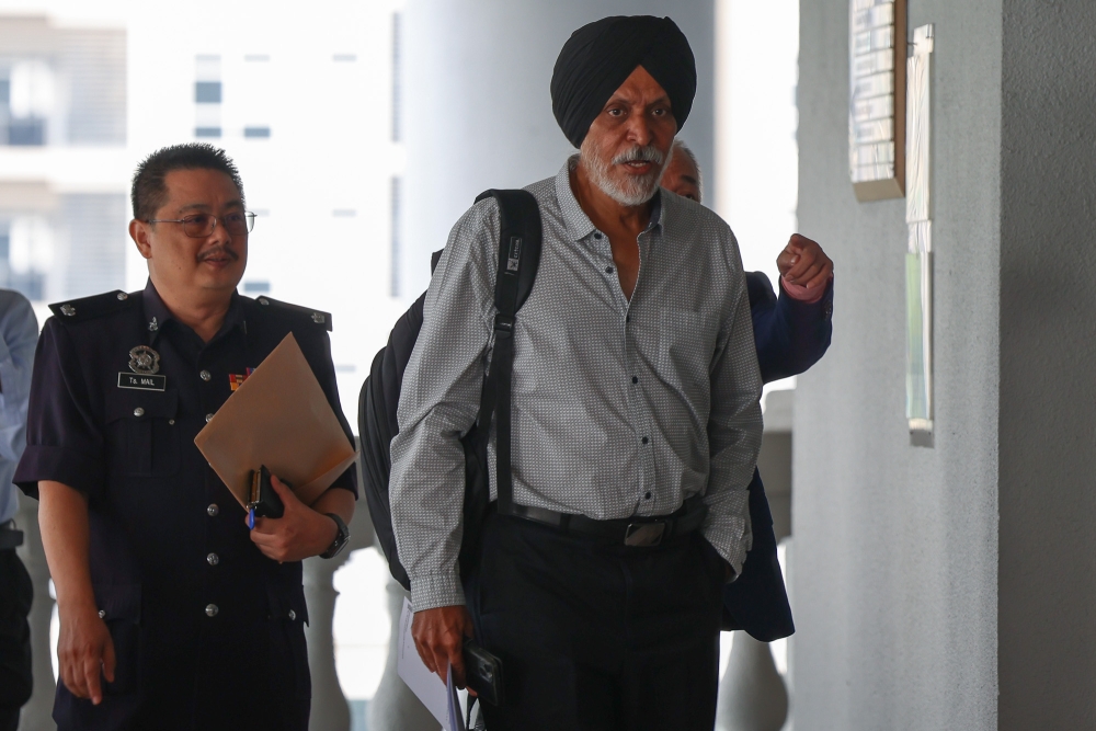 Police raided Pavilion Residence unit after CCTV showed govt vehicles moving boxes, bags, High Court told