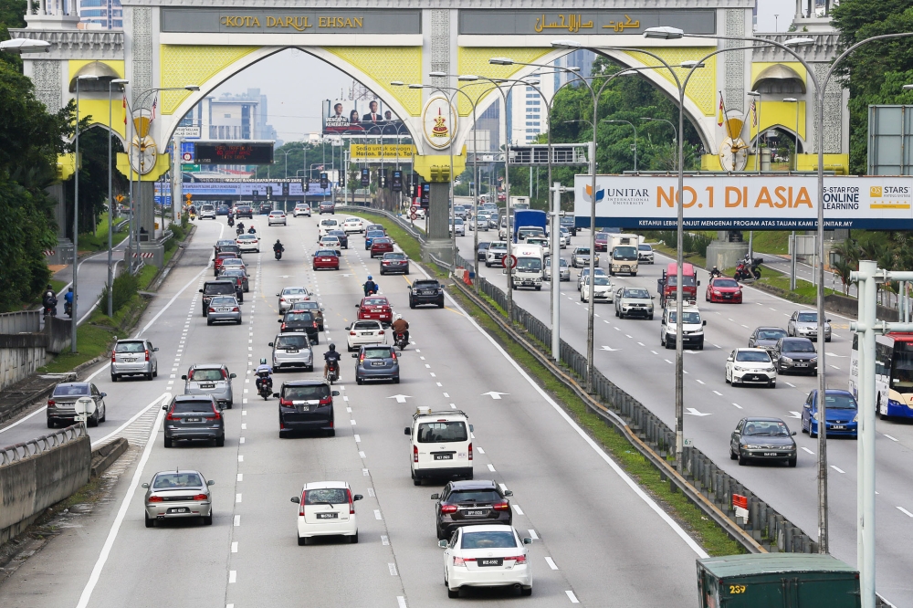 Traffic under control on first day of work-from-home policy, some major highways slow in KL Valley