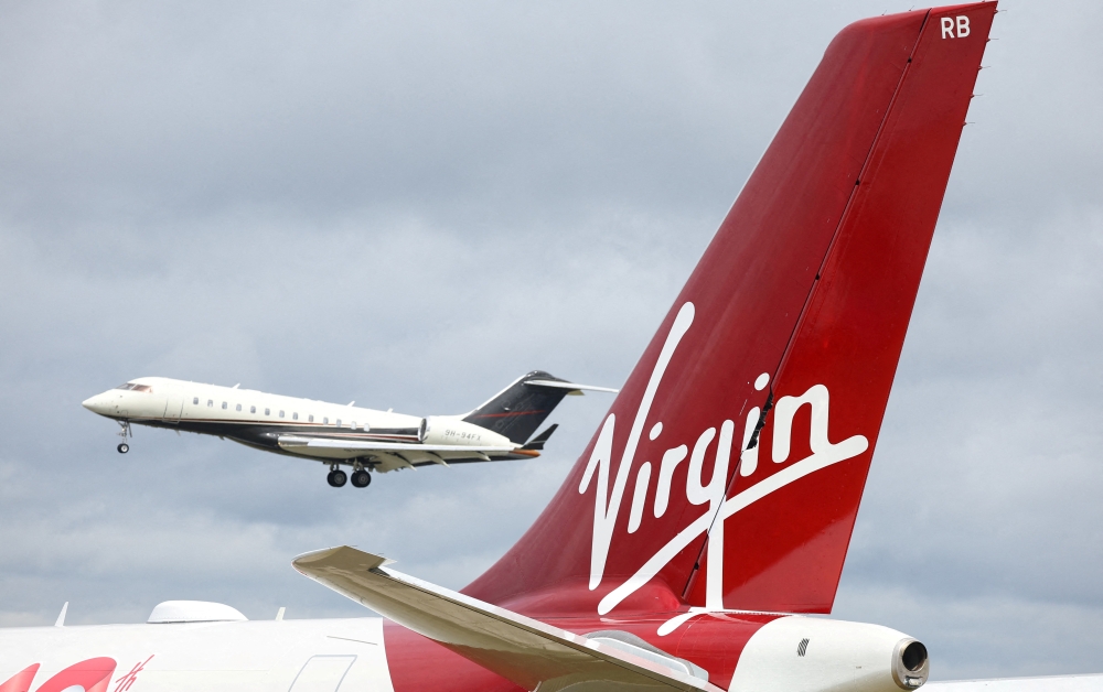 Branding for Virgin Atlantic is seen on a tail fin at the Farnborough International Airshow, in Farnborough, Britain July 22, 2024. — Reuters pic  