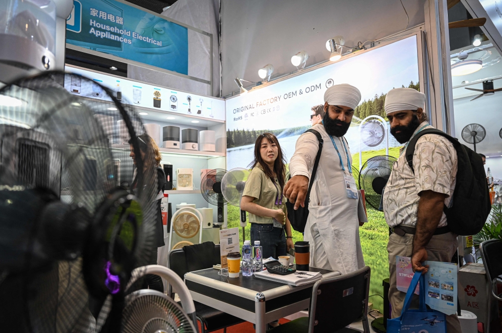 Buyers browser through products at the 139th session of China Import and Export Fair, also known as Canton Fair in Guangzhou, in southern China's Guangdong province on April 15, 2026. — AFP pic