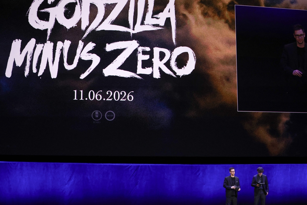 (From left) Interpreter Michael McNamara and Japanese director Takashi Yamazaki present the movie ‘Godzilla Minus Zero’ during ‘The State of the Industry’ and NEON presentation at CinemaCon at The Colosseum at Caesars Palace in Las Vegas April 14, 2026. — AFP pic