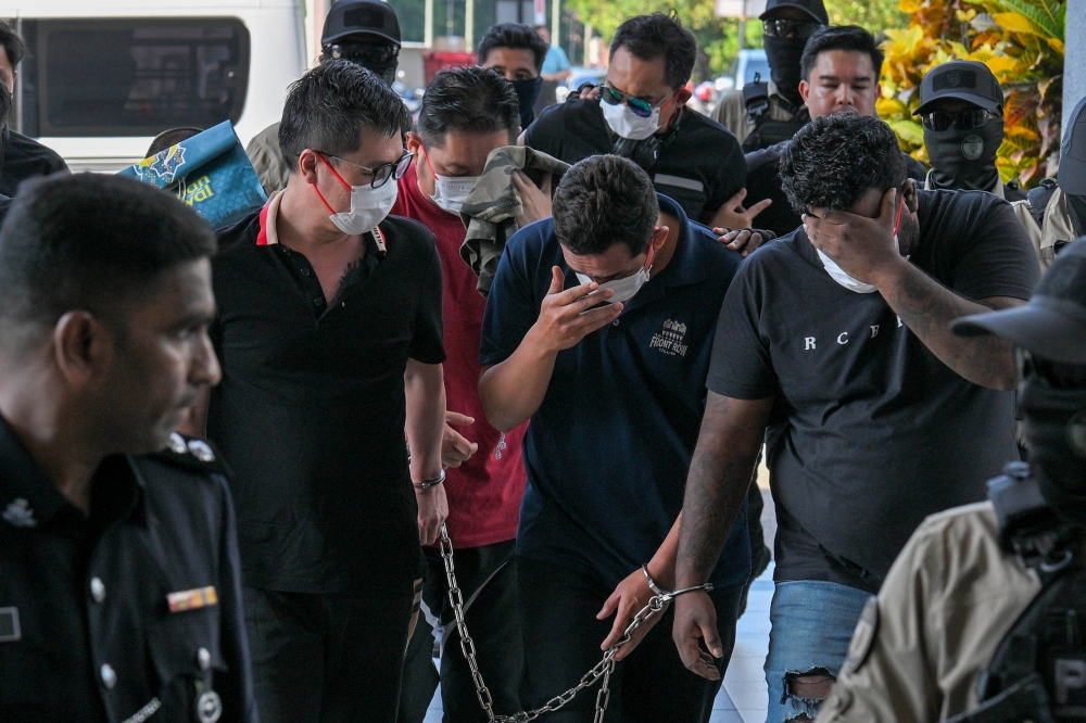 Police officer among six charged over RM4.4m gang robberies in Kepong homes, pleads not guilty