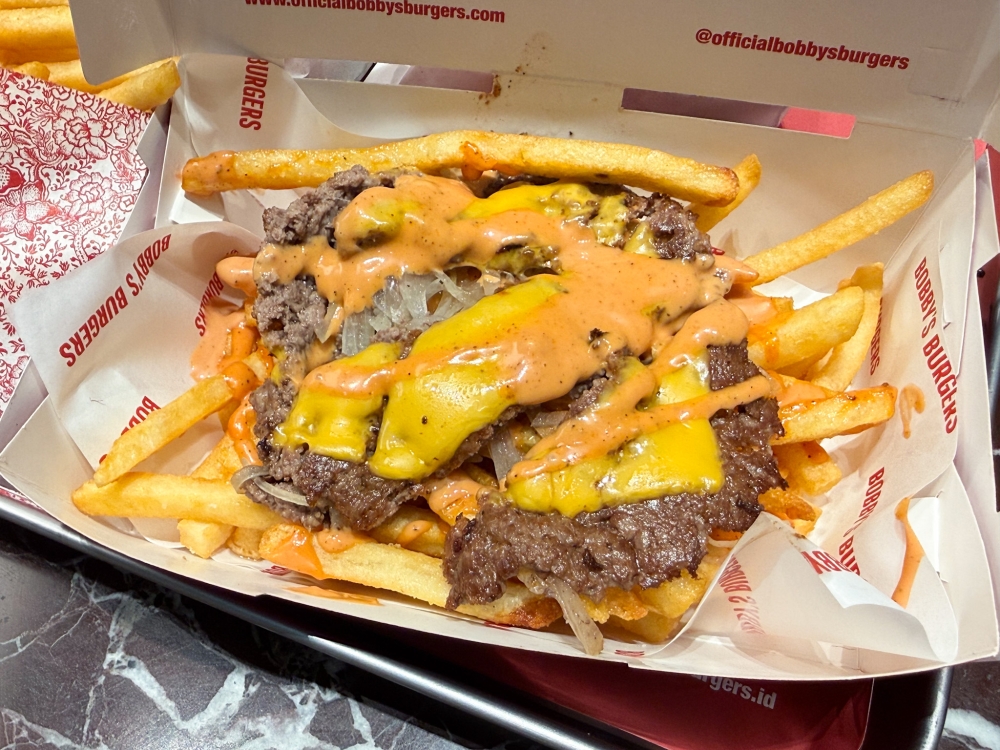 Filthy Fries combines a smashed beef patty with Tallow Fries and their signature Billionaire Sauce.