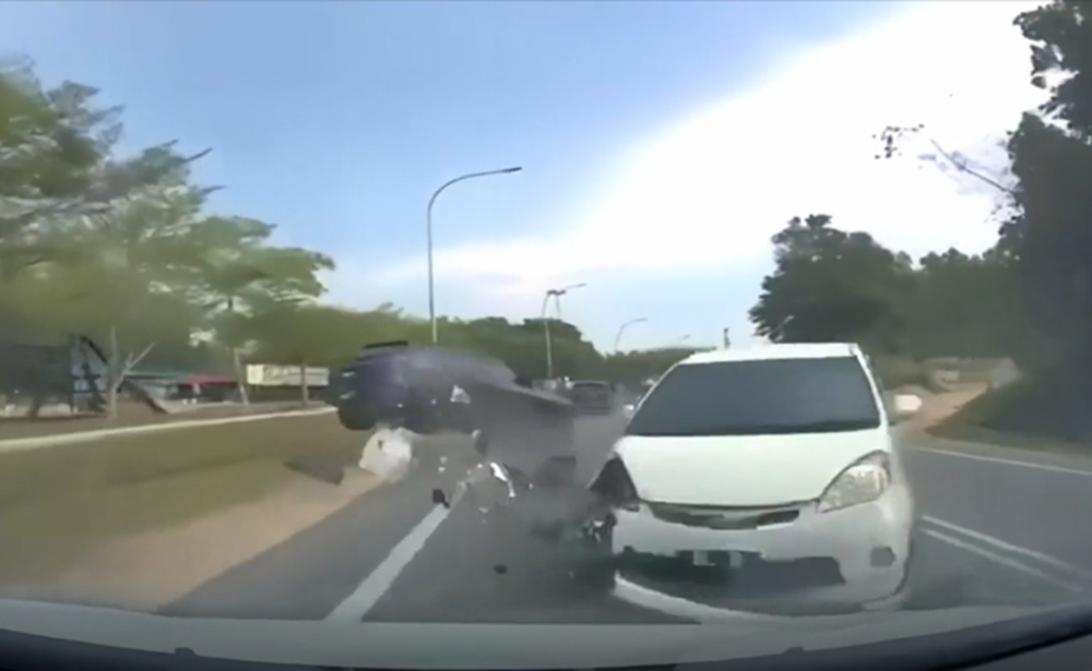 Dashcam video captures moment white Alza swerves into opposite lane before head‑on crash