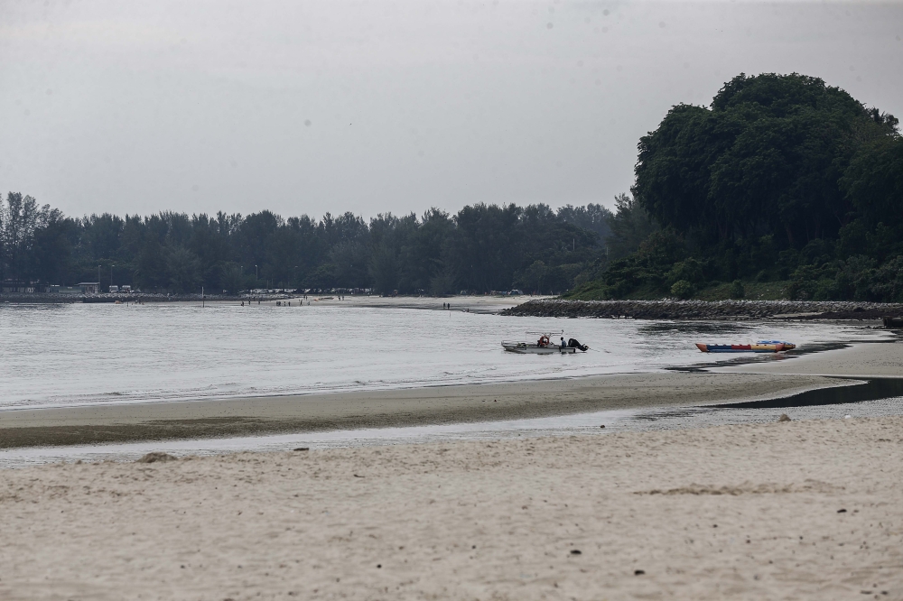 File photo of a public beach in Port Dickson July 23, 2023. — Picture by Sayuti Zainudin 