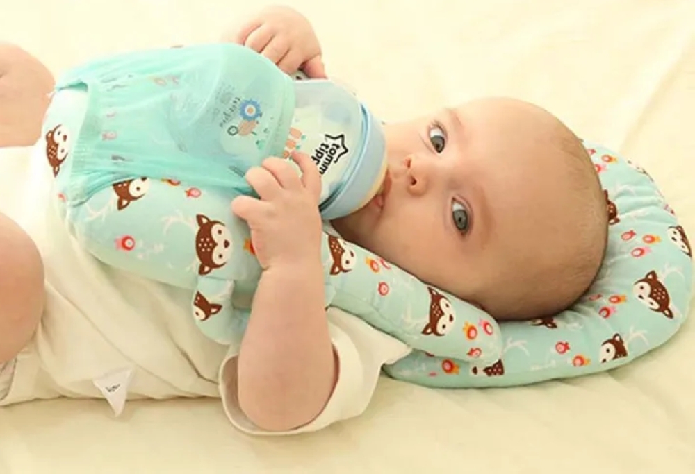 Singapore warns parents to stop using self-feeding baby pillows over choking risk