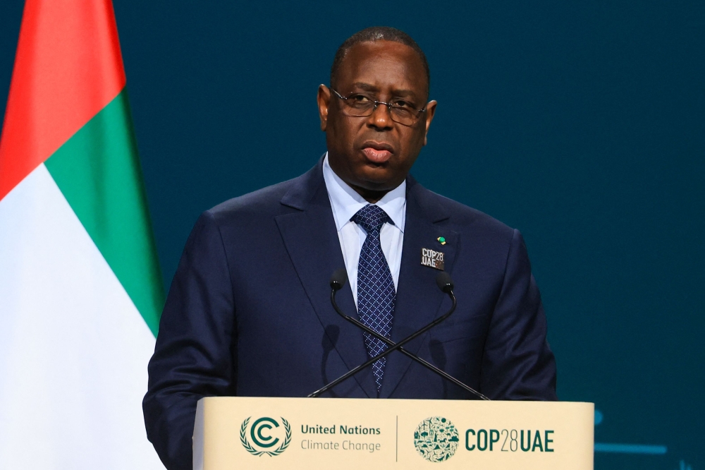 Senegal's Presdient Macky Sall speaks during the High-Level Segment for Heads of State and Government session at the United Nations climate summit in Dubai on December 1, 2023. — AFP pic 