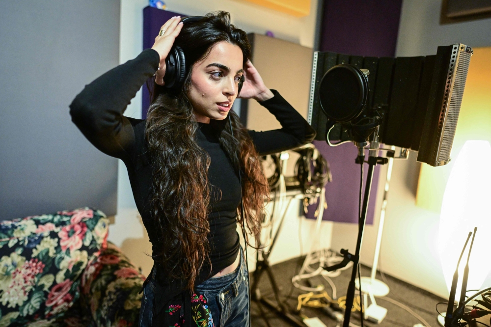 Singer Bianca Mihai, 25, is pictured during a rehearsal at a studio in Bucharest on March 26, 2026. — AFP pic