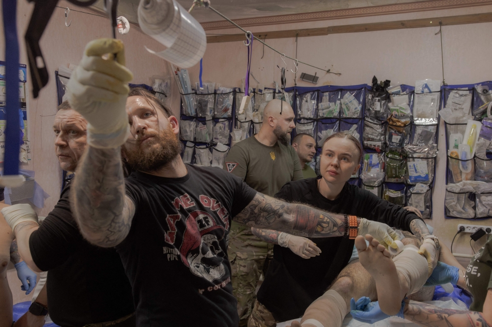 From love story to war zone: Ukrainian battlefield medics heal soldiers while losing their own pasts 