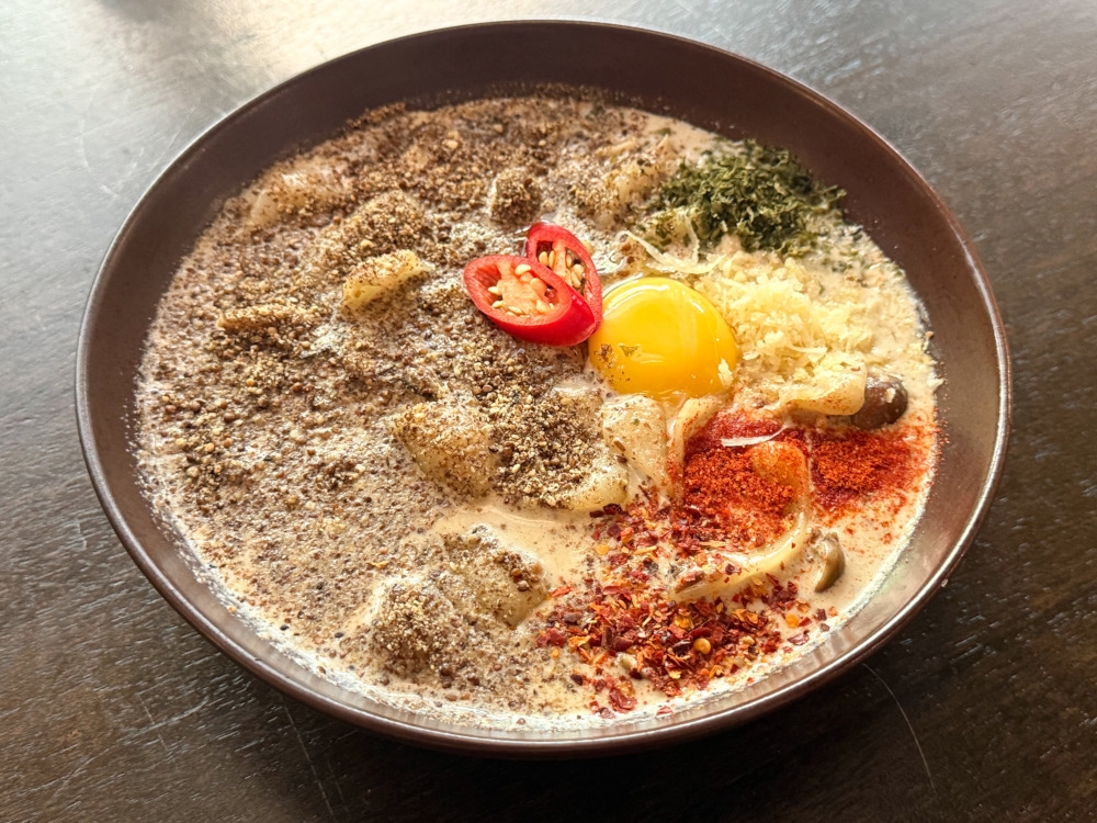 Bracken Fern Cream Noodles combines bracken fern, perilla seeds and seaweed with ‘sujebi’ for a fusion dish. — Picture by Lee Khang Yi