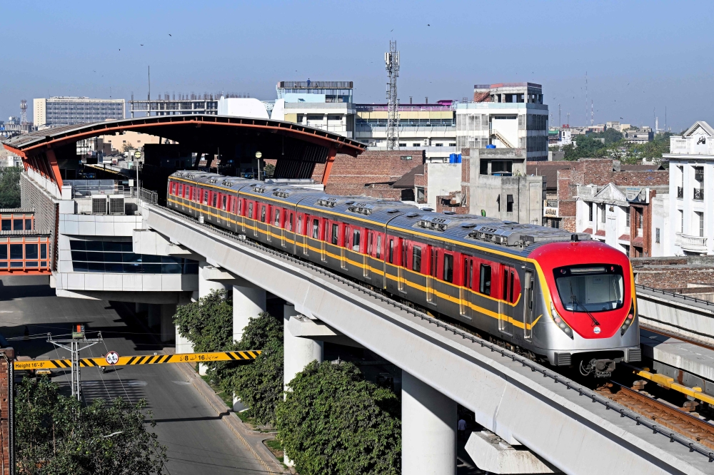 Commuters travel aboard a metro train in Lahore on April 20, 2026, as Pakistan government seeks to promote public transport in response to the global energy crisis triggered by the Middle East war. Oil prices surged on Monday, on a re-escalation of hostilities in the Middle East war after Iran closed the Strait of Hormuz at the weekend, just a day after reopening it, citing the United States' blockade of its ports. — AFP pic 