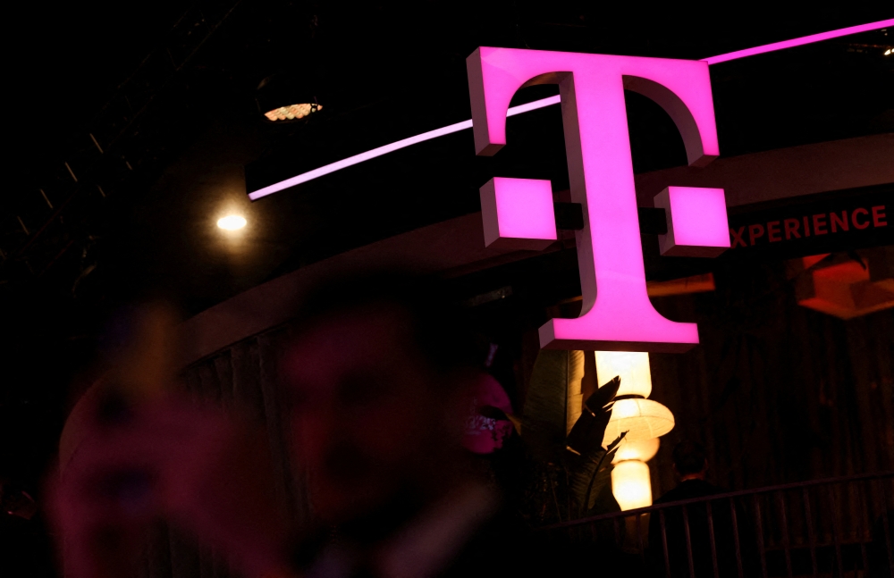 Deutsche Telekom is reportedly exploring a tie-up with T-Mobile US that could create a US$300 billion telecoms giant and become the biggest merger deal on record. — Reuters pic
