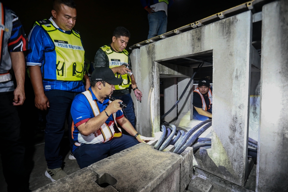 Power cables, including signal, communication and traction power cables, are targeted by thieves along rail tracks for their valuable metal content. — Picture by Sayuti Zainudin