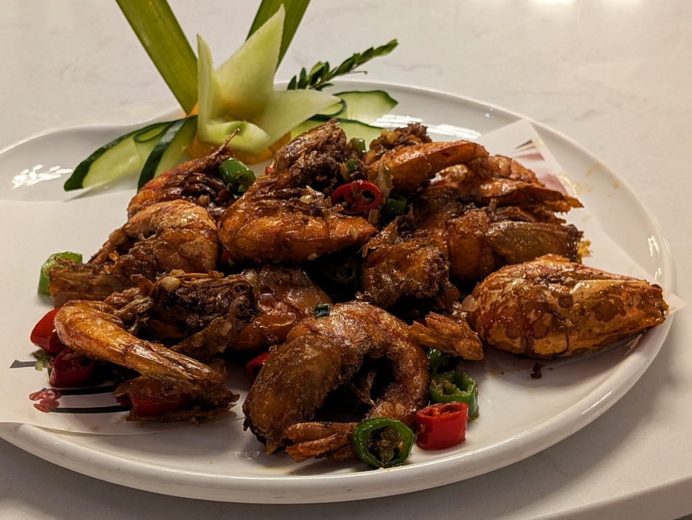 Salt-baked in name only, the salt-and-pepper tiger prawns were excellent. — Picture by Ethan Lau 