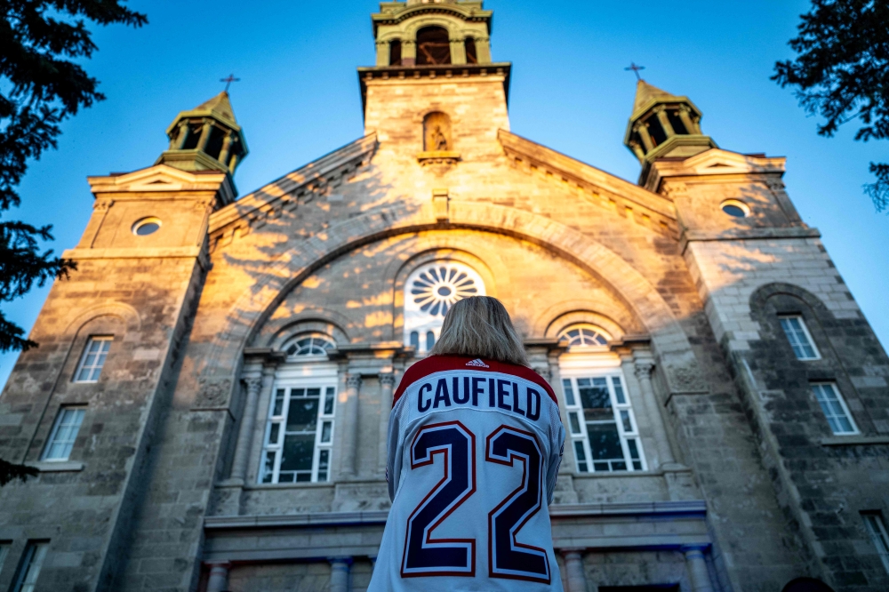 ‘Hockey is religion’: Montreal fans pack church for playoff push