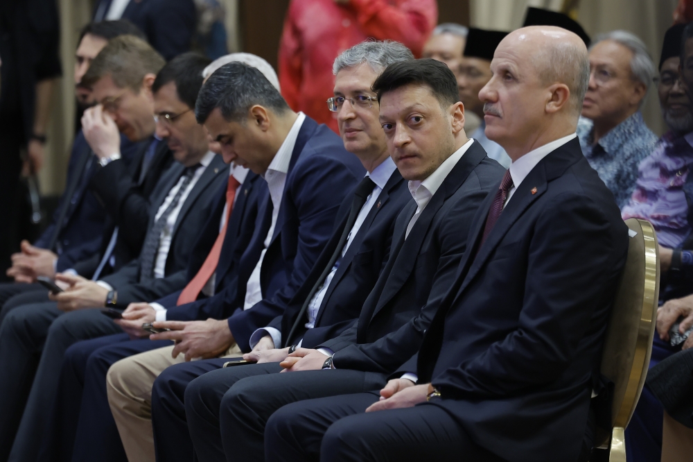 Mesut Ozil says Malaysia could raise local football standards with attention to youth development, academies