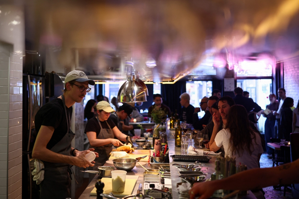 Hugo Hivernat’s restaurant Gigi’s where he charges US$40 for a plate of half a roast chicken, is at the centre of a debate on the cost of living in New York City in April 2026. — AFP pic