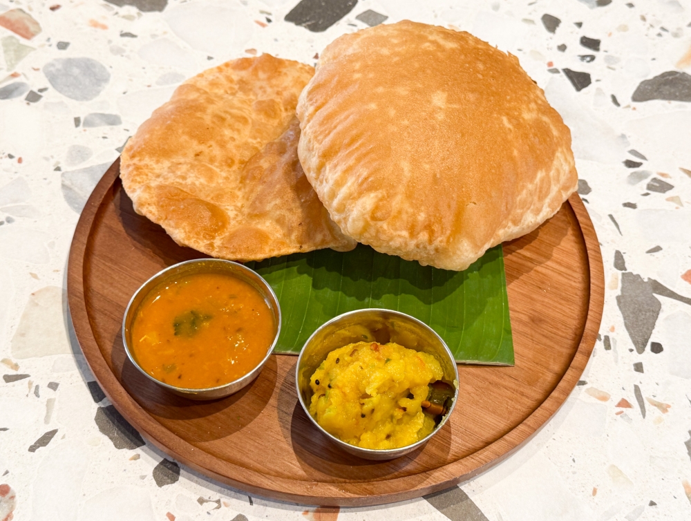 Poori Masala is a fun way to eat puffy deep fried bread with potato masala. — Picture by Lee Khang Yi