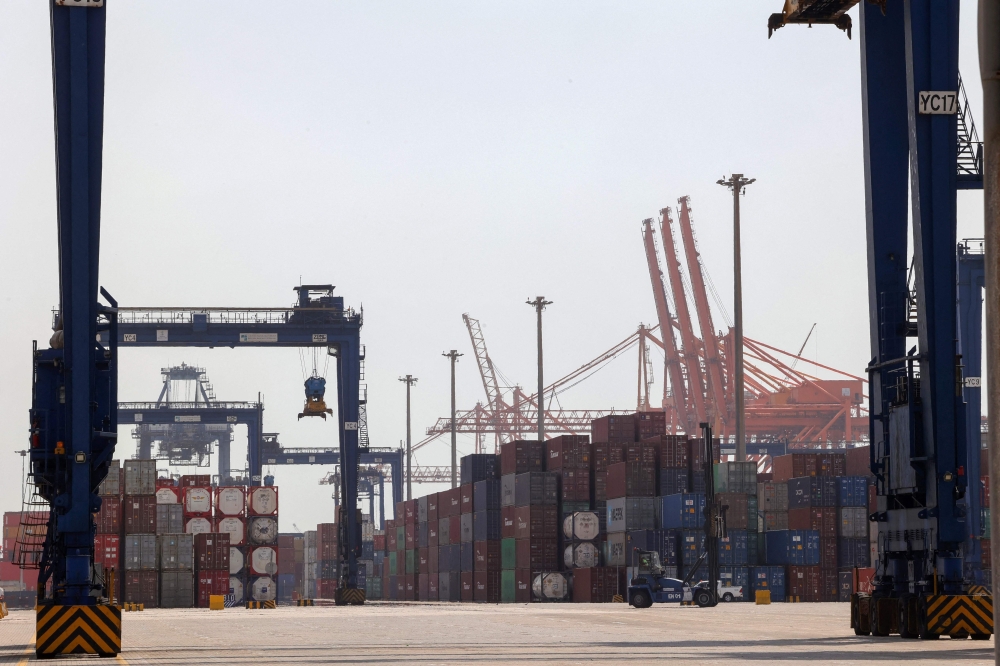 A picture taken March 1, 2022 shows a view of cranes and shipping containers at a loading dock of Jeddah’s Islamic Seaport on Saudi Arabia’s western Red Sea coast. Locally, over the past two months, the blockade of the Strait of Hormuz has also prompted shipowners to find alternative land routes to deliver, by lorry, foodstuffs and manufactured goods that can no longer reach the Gulf’s coastal countries by sea. — Reuters pic 