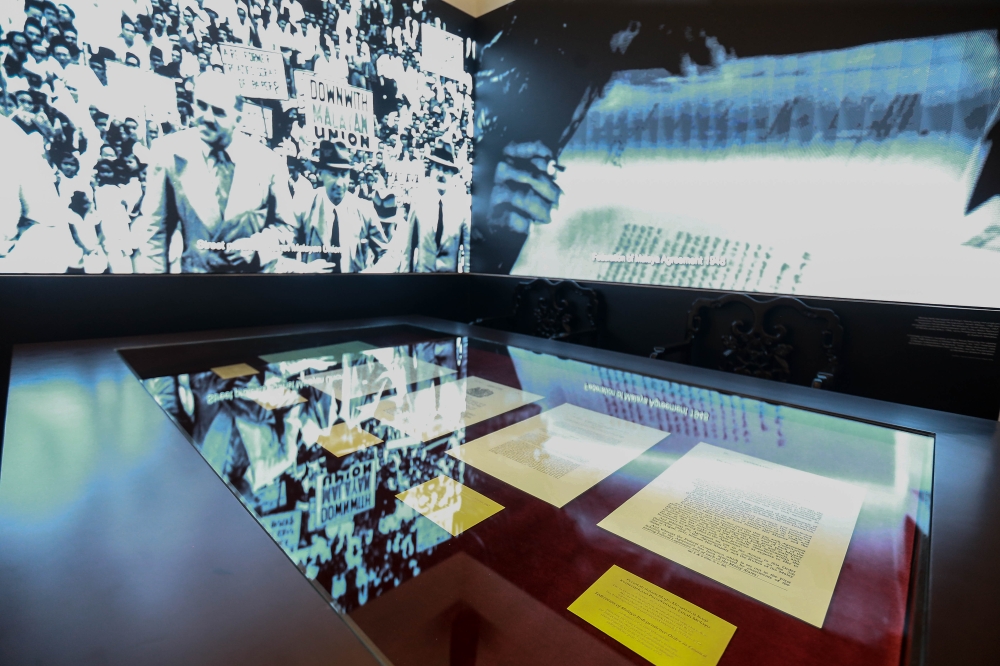 A view of historical documents and pictures in the main gallery during a curated tour of the newly-restored Seri Negara building at Persiaran Tuanku Jaafar. — Picture by Sayuti Zainudin 