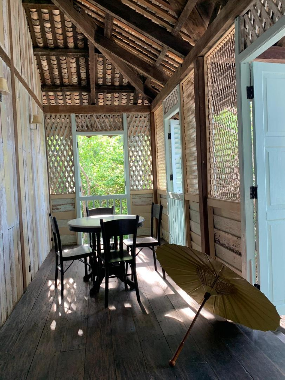 The Resthouse: A restored wooden home on Pulau Perhentian, rebuilt plank by plank from a pre-war structure in Batu Gajah and now fully powered by solar energy.