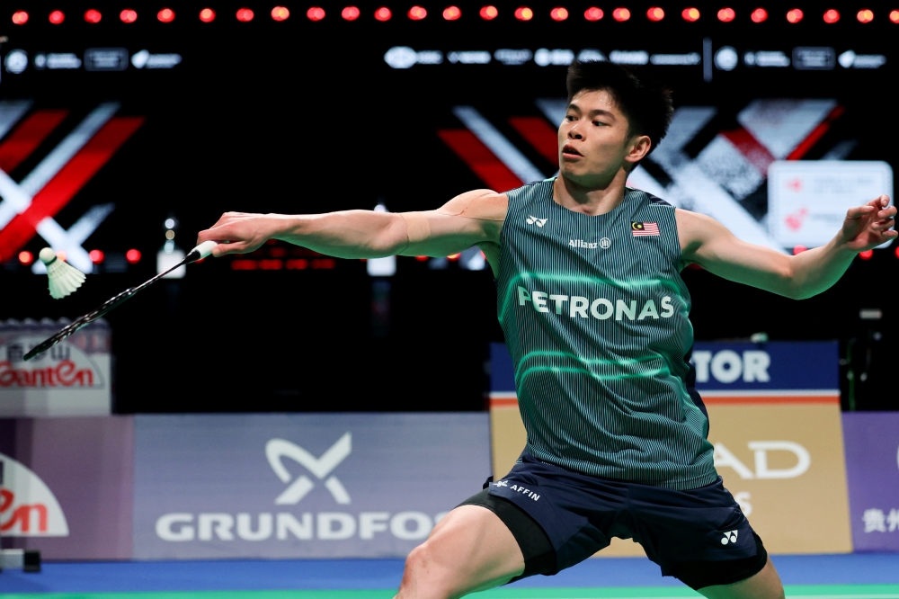 Malaysia men’s singles player Leong Jun Hao in action against world number one Shi Yu Qi of China during their quarter-final match at the BWF Thomas and Uber Cup Finals 2026 at Forum Horsens May 1, 2026. — Bernama pic