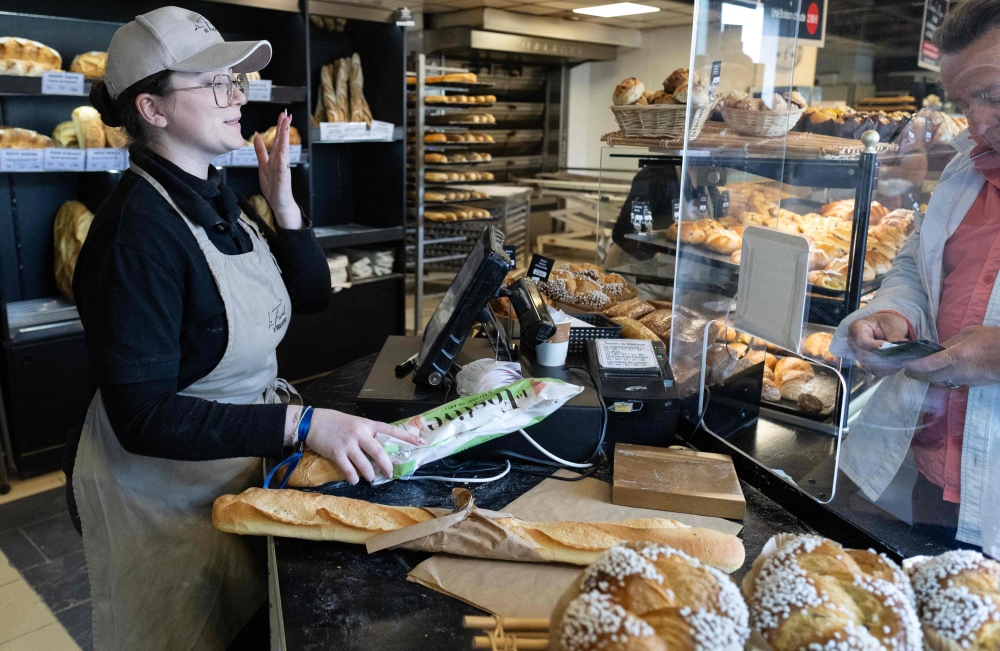 French bakeries opened with government backing on Labour Day, despite unions arguing May 1 should remain a compulsory rest day. — AFP pic