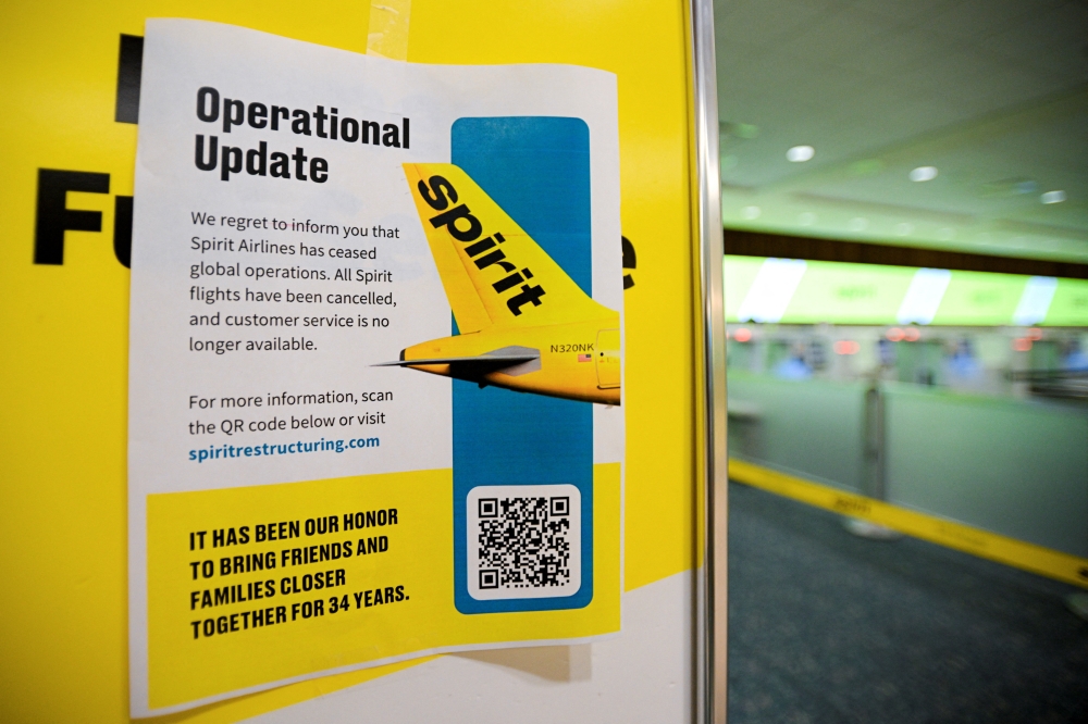 A Spirit Airlines operational update notice at Orlando International Airport, after Wall Street Journal reported that Spirit Airlines is preparing to cease operations around 3am today (0700 GMT/3pm Malaysian time), after hitting an impasse in talks with some creditors on a US$500 million government bailout plan, in Orlando, Florida May 2, 2026. — Reuters pic