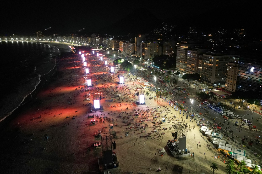 This aerial view shows fans gathering as DJ Vintage Culture performs ahead of the concert of Colombian singer Shakira, at Copacabana beach in Rio de Janeiro May 2, 2026. — AFP pic 