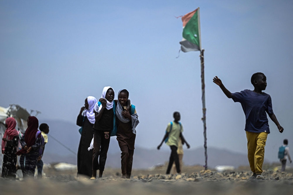 Sudanese students leave a school operated by the Sudanese Coalition for Education for All,  in partnership with the United Nations International Children’s Emergency Fund (Unicef), south of Port Sudan on April 26, 2026. — AFP pic 