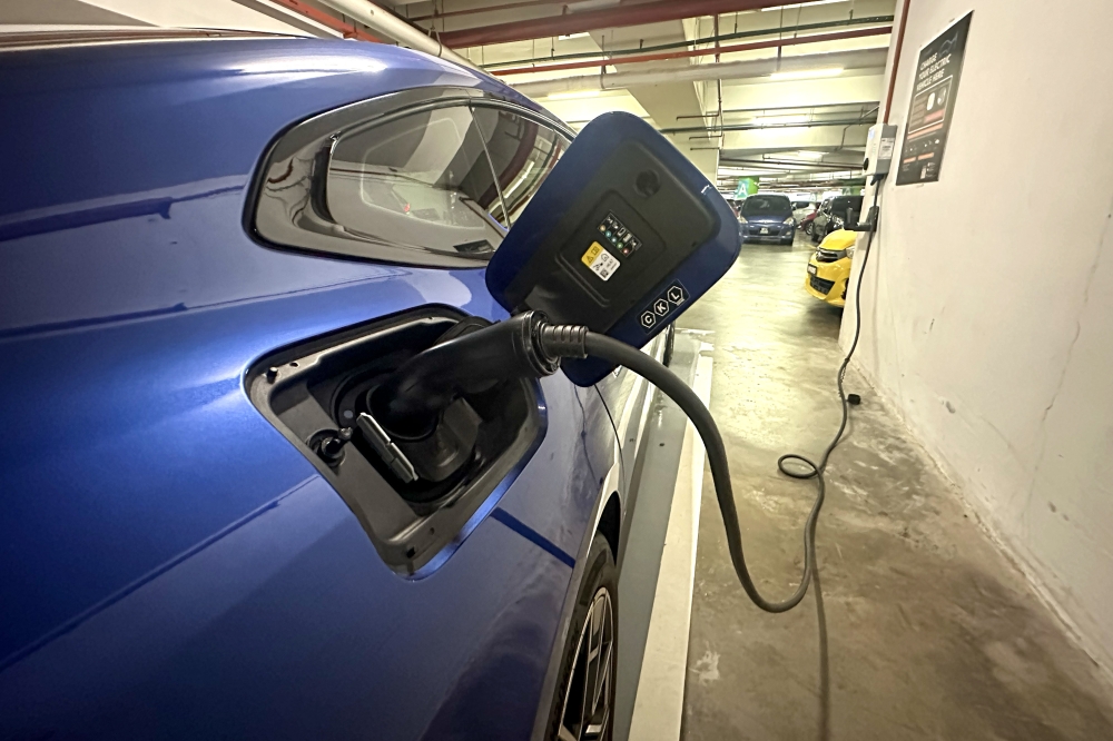 File picture of an electric vehicle (EV) charging at an EV charging station in Putrajaya June 18,  2024. — Picture by Shafwan Zaidon