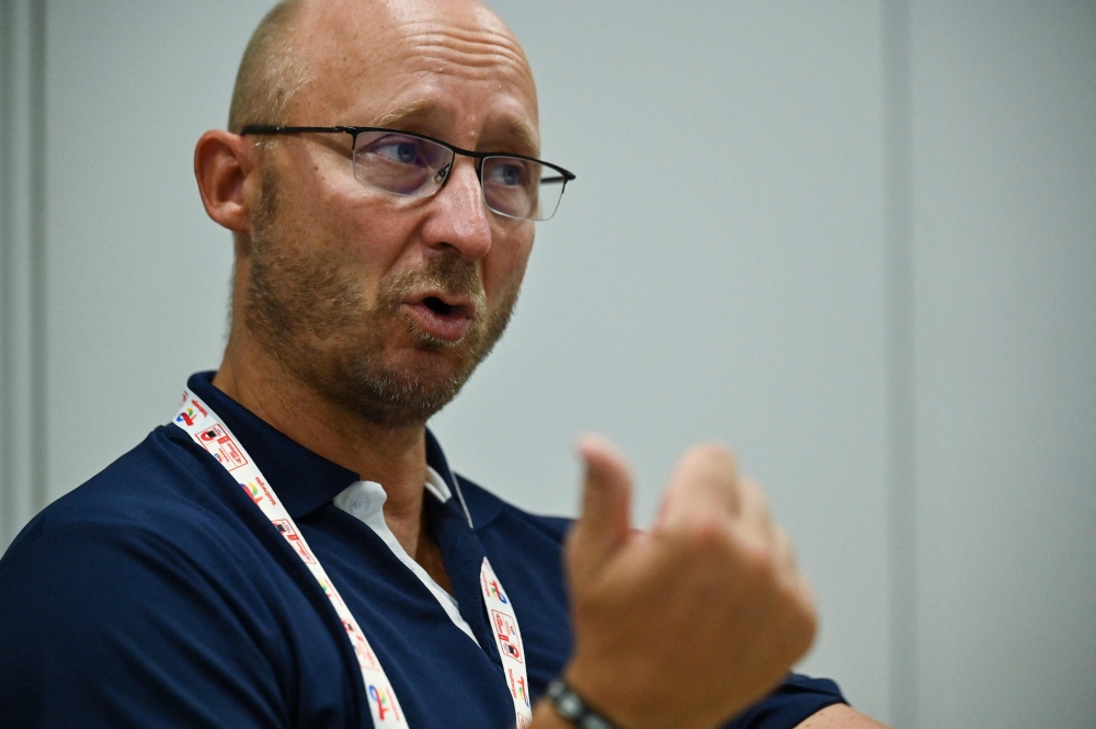 Badminton World Federation secretary general Thomas Lund of Denmark acknowledges that the changes to the way the sport is played has ruffled traditionalists. — AFP pic