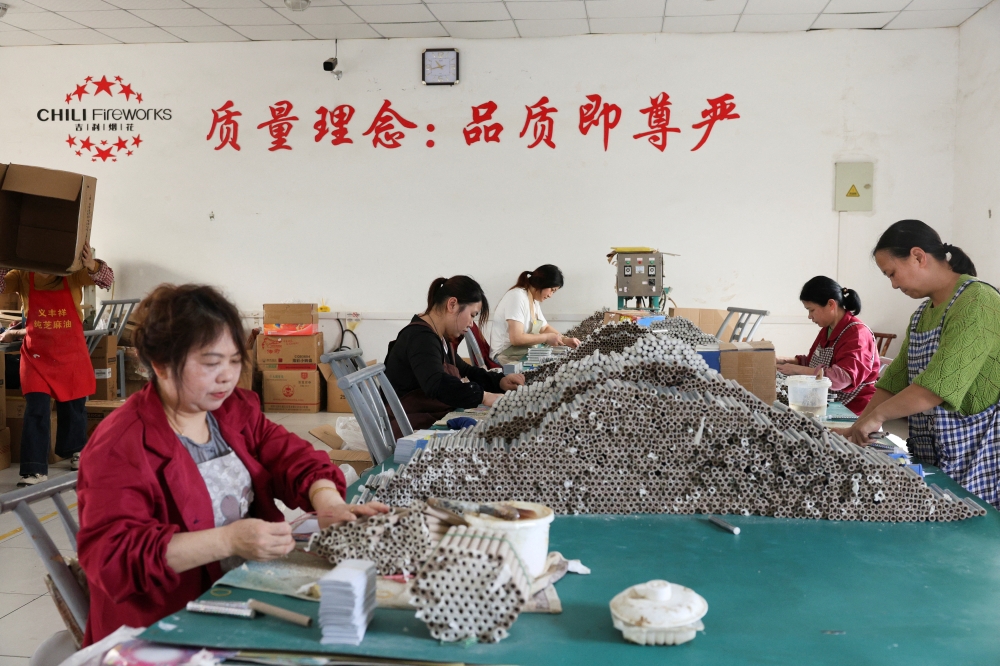 Employees work to assemble firework products at Chili Fireworks factory in Liling, Hunan province, China, April 10, 2026. — Reuters pic