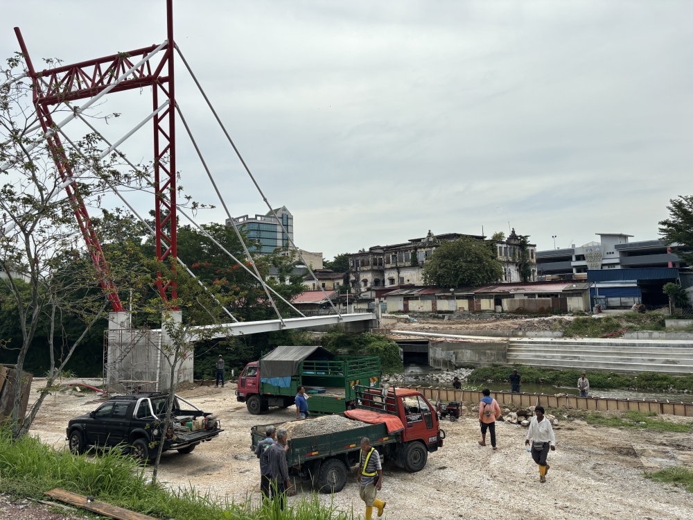 A riverfront area under development along Sungai Kinta near Hugh Low Street in Ipoh, which is set to reshape how people move between Ipoh’s Old Town and New Town. — Picture by John Bunyan