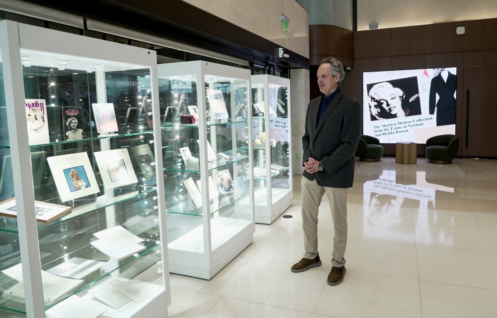 A person looks at memorabilia belonging to late model and movie star Marilyn Monroe displayed during a preview ahead of an upcoming auction in Los Angeles, California May 8, 2026. — Reuters pic