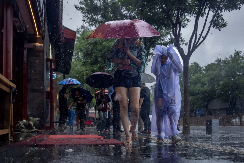 Umbrella and raincoat weather: MetMalaysia warns of thunderstorms in KL, Putrajaya and parts of Sabah, Sarawak tonight