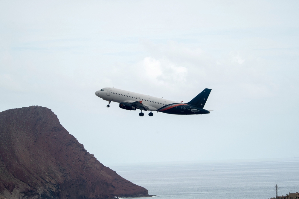 A plane bound for the UK carrying passengers evacuated from the Dutch flagged hantavirus-stricken cruise ship MV Hondius leaves the Tenerife Sur-Reina Sofia airport on the island of Tenerife in Spain's Canary Islands on May 10, 2026. — AFP pic 
