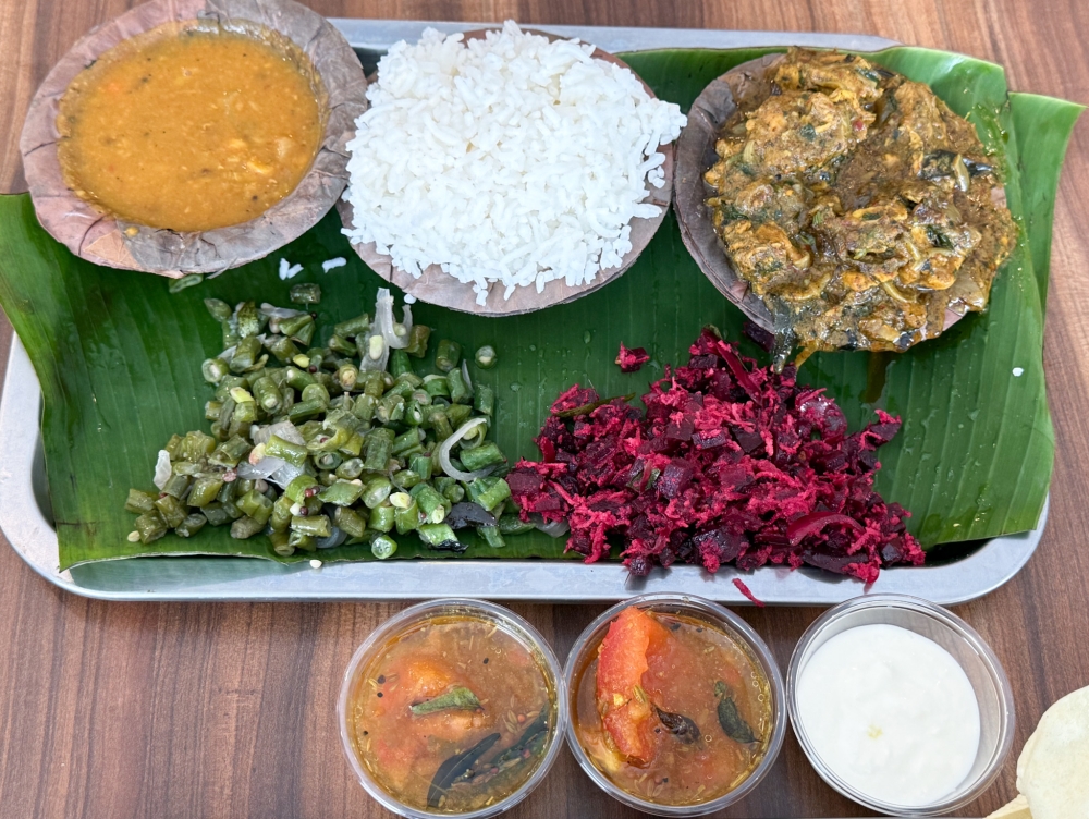 Curry leaf chicken is served with their Chicken Thali set and two types of vegetables — Picture by Lee Khang Yi