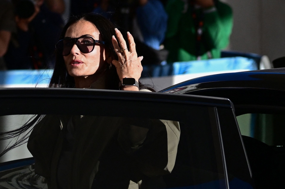 Member of the jury US actress and producer Demi Moore arrives for a dinner with fellow members of the jury at the Grand Hyatt Cannes Hotel Martinez on May 11, 2026. — AFP pic
