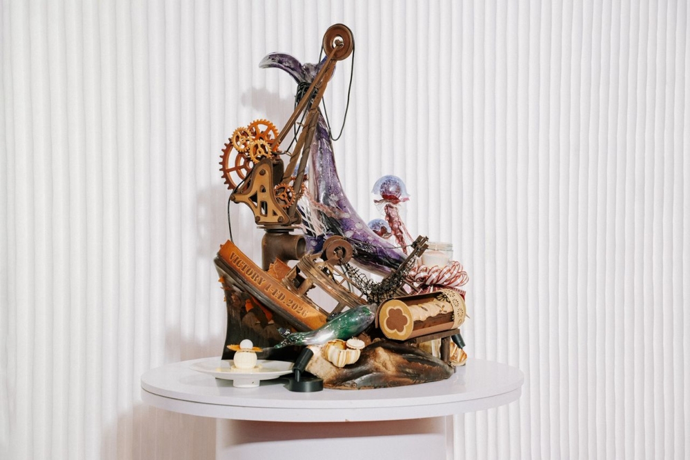 The Malaysian team’s final set-up for the Asian Pastry Cup, comprising a sugar sculpture, a chocolate sculpture and three desserts. — Picture courtesy of APCA