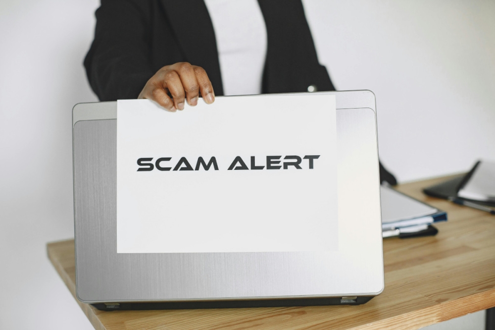 Injunctions needed to prevent scam advertising — Ong Tze Chin