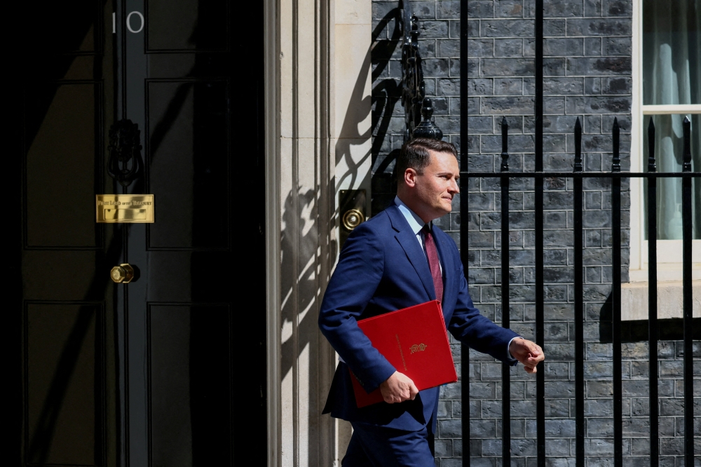 British Health Secretary Wes Streeting walks after attending a cabinet meeting at Downing Street in London, Britain on May 12, 2026. — Reuters pic