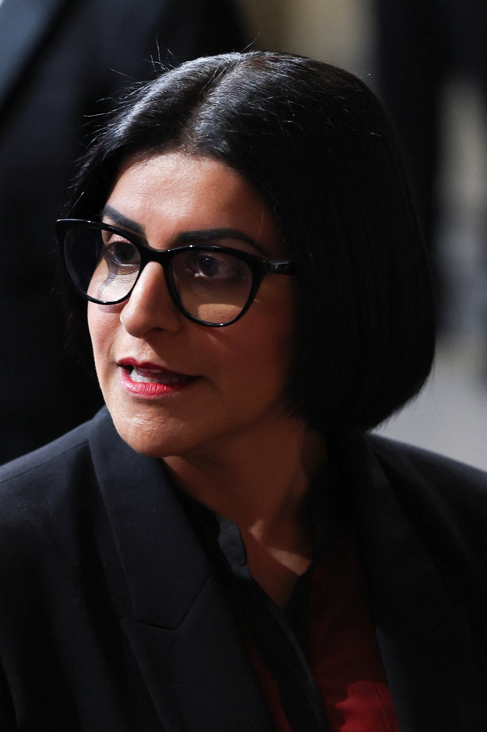 British Home Secretary Shabana Mahmood walks through the House of Commons to attend the State Opening of Parliament at the Palace of Westminster, London May 13, 2026. — Reuters pic