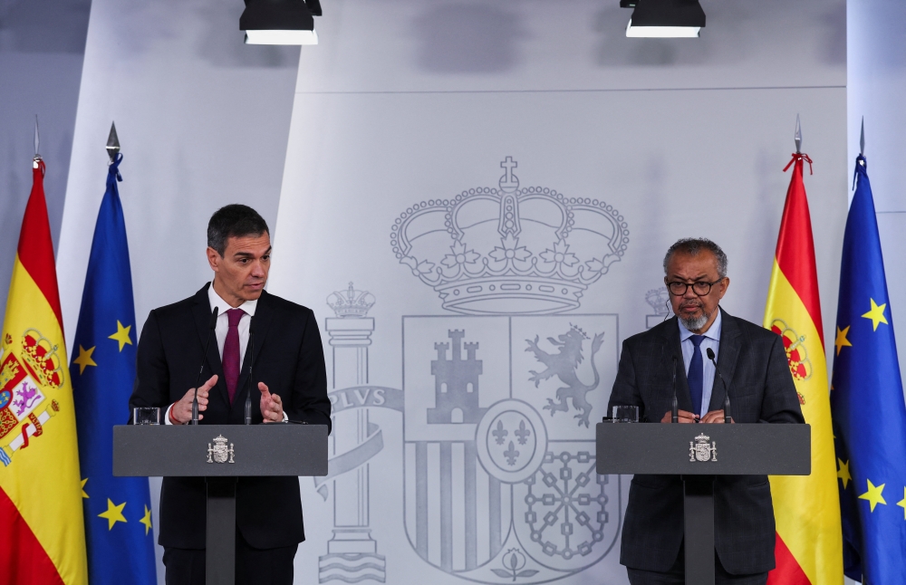 Spanish Prime Minister Pedro Sanchez and World Health Organization (WHO) Director-General Tedros Adhanom Ghebreyesus hold a joint press conference at Moncloa Palace in Madrid, Spain on May 12, 2026. — Reuters pic