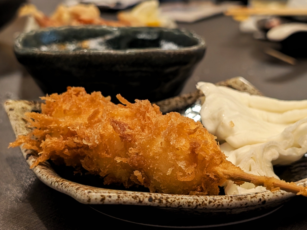 ‘Kushikatsu’ is a different type of skewer, where the ingredients are deep-fried then skewered, like this quail egg. — Picture by Ethan Lau