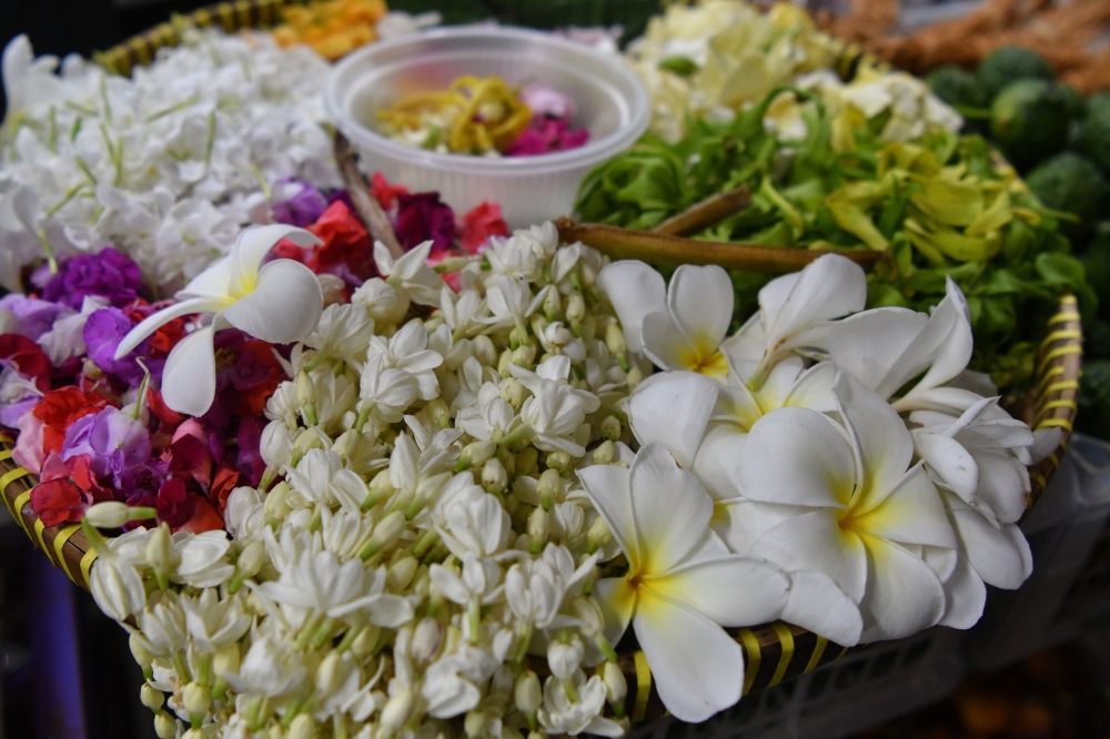 Traditional flowers and herbs sold at Pasar Siti Khadijah continue to attract customers seeking flower baths for wellness, beauty and cultural practices. — Bernama pic