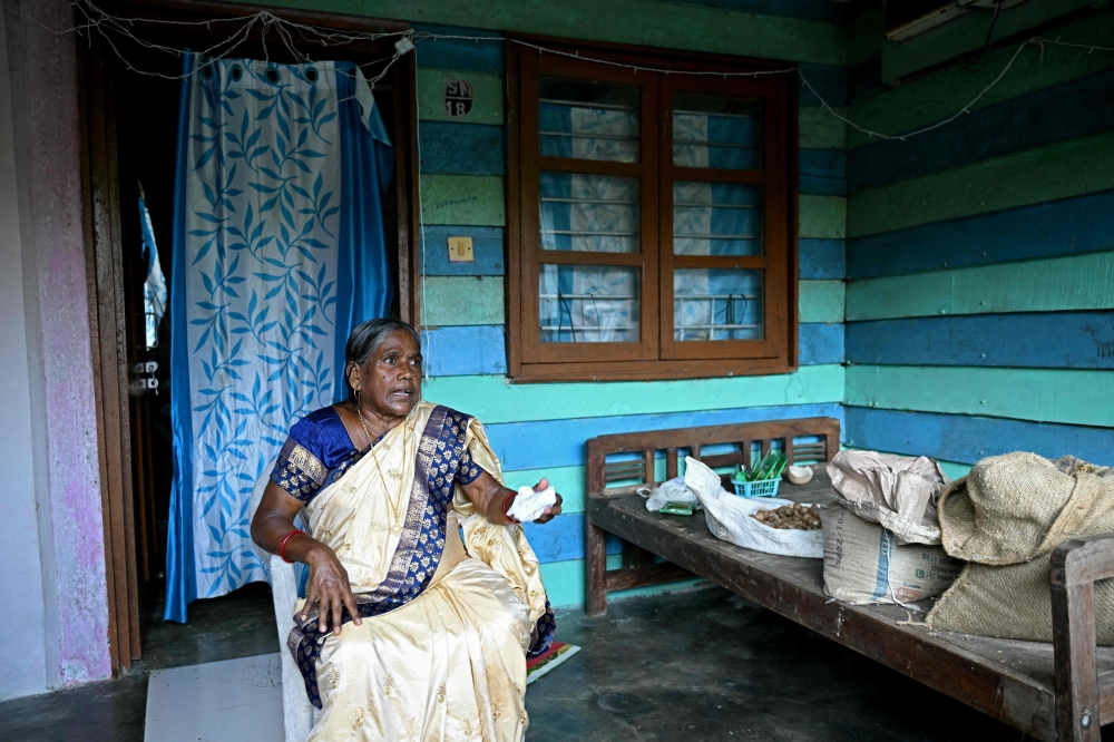 This photograph taken on March 26, 2026 shows Kusum Mishra, a settler who migrated with her husband from western India’s Maharashtra about five decades ago, sitting outside her residence in Shastri Nagar village on the outskirts of Campbell Bay in Great Nicobar Island. — AFP pic 